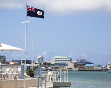 Dock with the Cayman flag flying